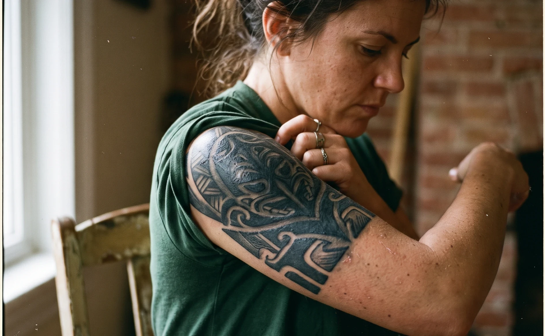 A large, dark tattoo — fading widens cover-up options